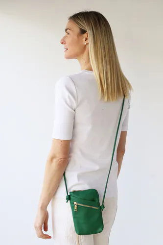 Model wearing Emerald Green Long Cross Body Shoulder Strap Bag By Archer House Available at Beetees Nelson
